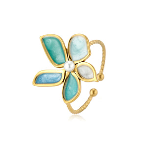 Ring turquoise bloem goud