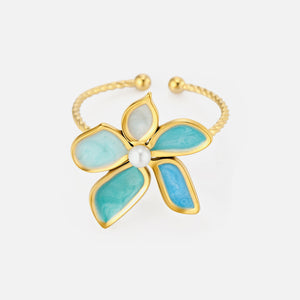 Ring turquoise bloem goud