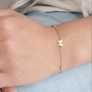Armband drie vlinders goud