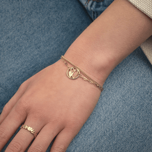 Armband dubbel hartje gesloten goud