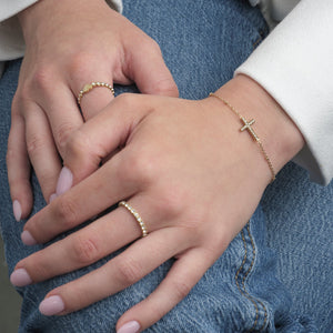 Armband kruisje steentjes goud