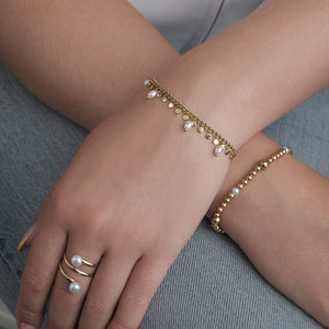 Armband parel muntjes goud