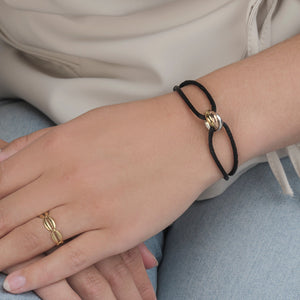 Connected armband trinity goud