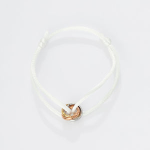 Connected armband trinity goud wit