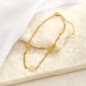 Enkelband smiley goud