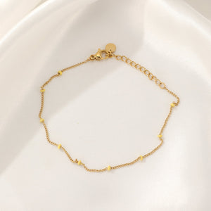 Fijne bolletjes armband goud/geel