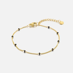 Fijne bolletjes armband goud/zwart