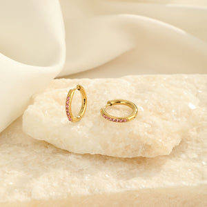 Hoops met steentjes roze/goud