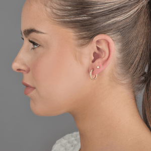 Hoops met steentjes wit/goud