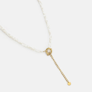 Kralen ketting wit goud