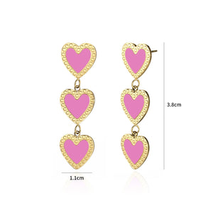 Oorbellen hangende hartjes roze