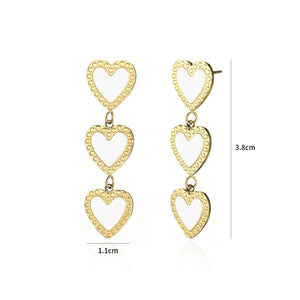 Oorbellen hangende hartjes wit