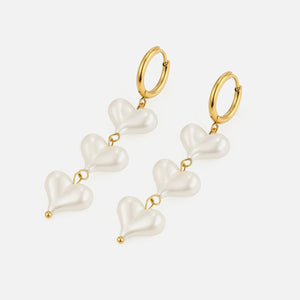 Oorbellen hangende parel hartjes goud