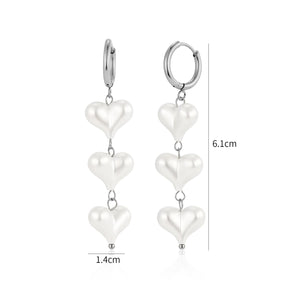 Oorbellen hangende parel hartjes zilver