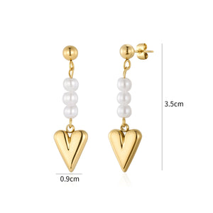 Oorstekers hangend hart parels goud
