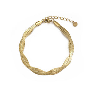 Platte gedraaide armband goud