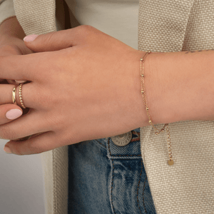 Tweelaags bolletjes armband goud