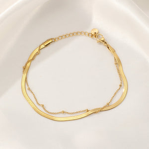 Tweelaags plat & bolletjes goud