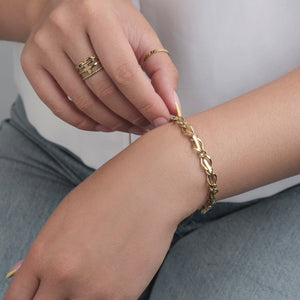 Vlecht schakel armband goud