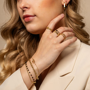 Armband verbonden hartjes goud