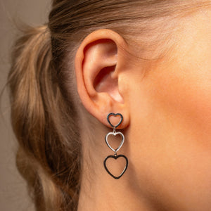 Drie hangende hartjes zilver