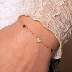 Drie hartjes armband goud