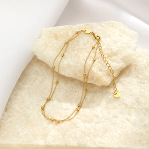 Enkelband tweelaags balletjes goud